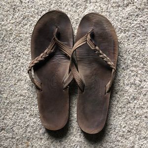 Rainbow braided flip flops